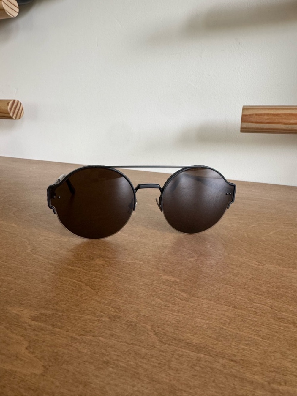 Bottega Veneta Black Frame Sunglasses with Brown Lenses